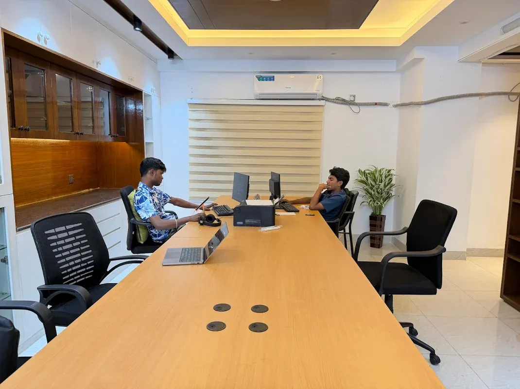 Team members at work in the Probfly IT meeting room