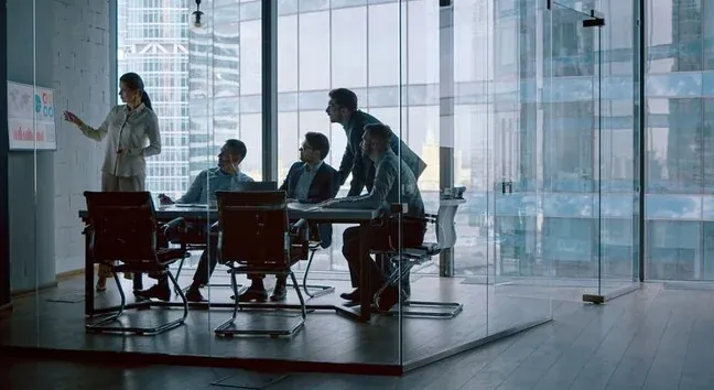 A team reviewing campaigns in a meeting room